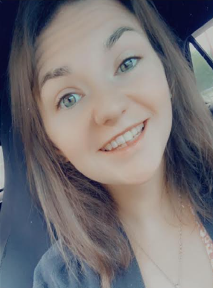 smiling woman in a car